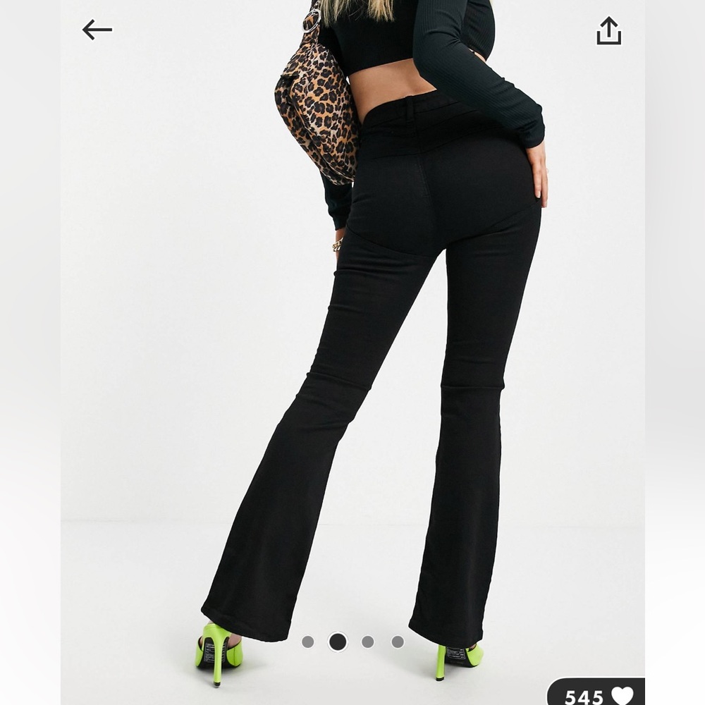 ASOS Design Petite High Rise Flare Jeans in Black